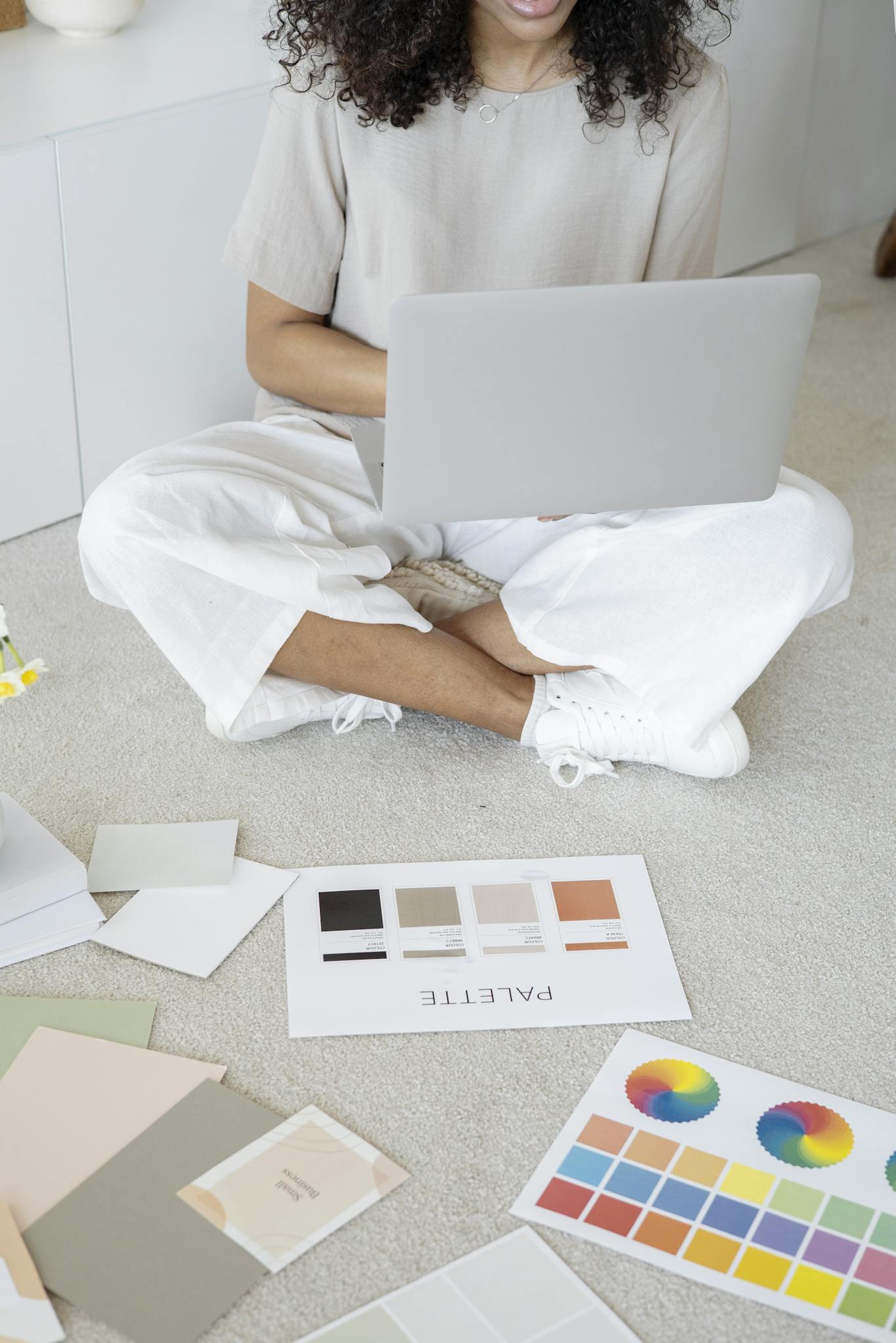 Young Woman Reviews Color Palettes For Design